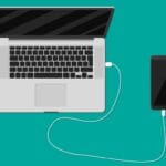 mobile phone charging from laptop usb port vector