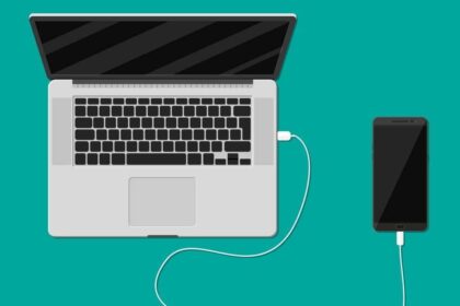 mobile phone charging from laptop usb port vector